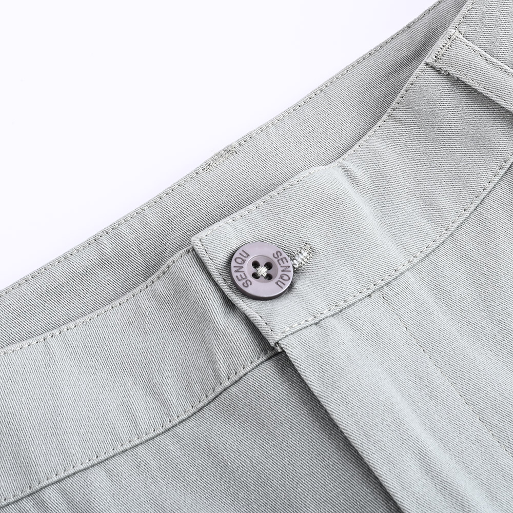 Botón metálico del pantalón de trabajo