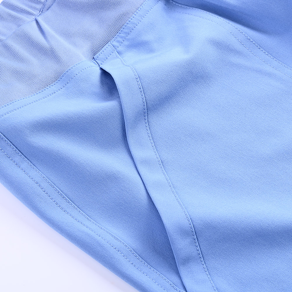 Unión de la cintura elástica con el pantalón médico