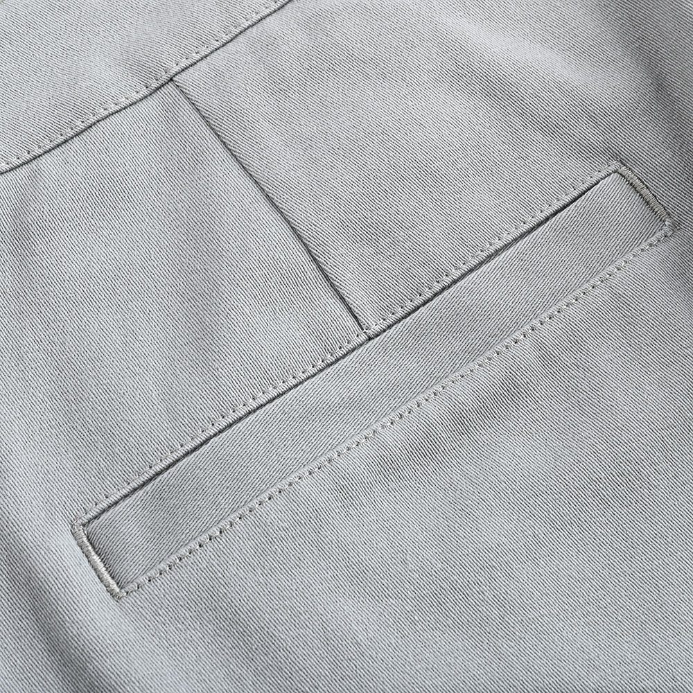 Bolsillo trasero de vivo del pantalón de trabajo